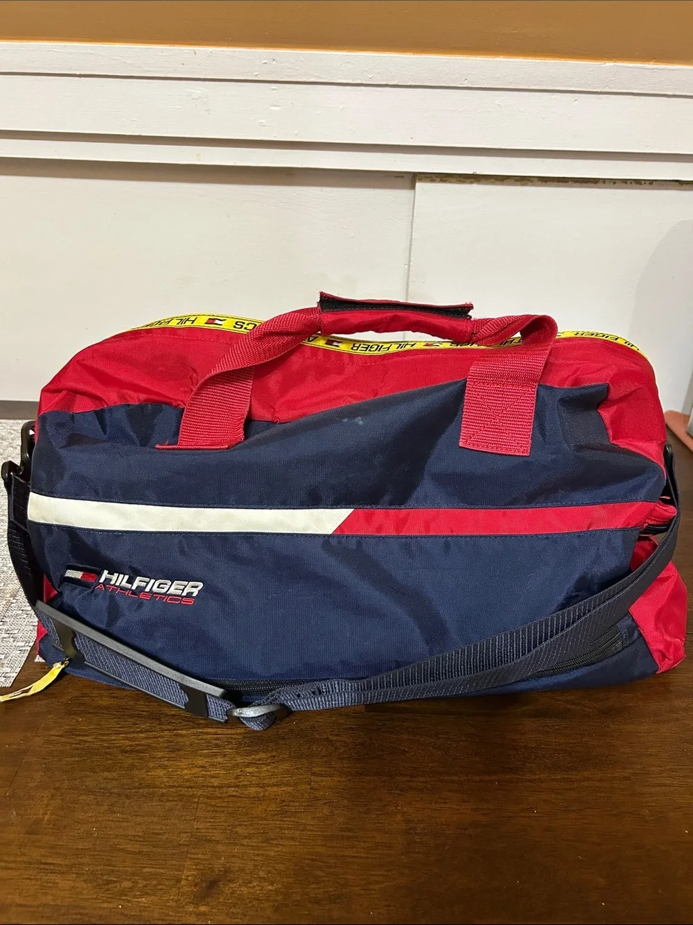 Red Athletic Duffle Bag with Navy and Yellow Accents Tommy Hilfiger
